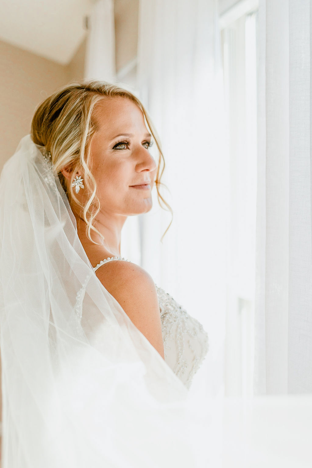 This beautiful Ohio wedding is a like a dream! We love the beautiful pink touches, gorgeous flowers, soft light, and contagious smiles from this adorable couple. If you're leaning towards a blush wedding of your own, you need to check this one out! This couple knows how to plan an amazing wedding! 